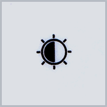 Przycisk jasności i nasycenia (symbol słońca, po lewej)
